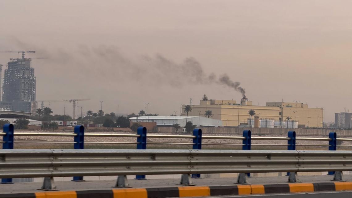 A column of smoke rising from the U.S. Embassy compound in Baghdad.