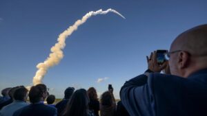 Future lunar base and astronauts walking on the Moon