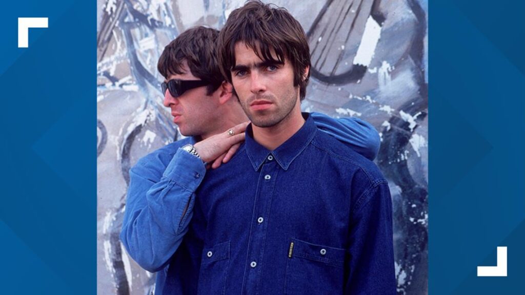 Wu-Tang Clan members lined up posing and performing together