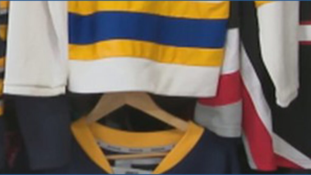 Buffalo Sabres fans celebrating at a local watch party