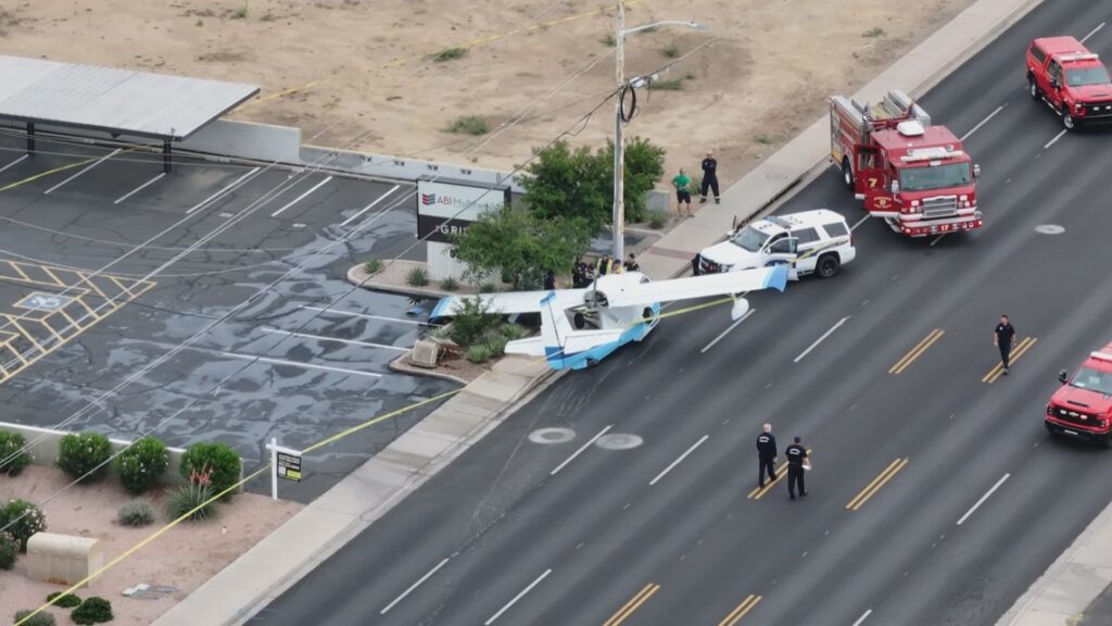 A 1946 Republic RC-3 Seabee seaplane safely on the ground after an emergency landing on a Phoenix street