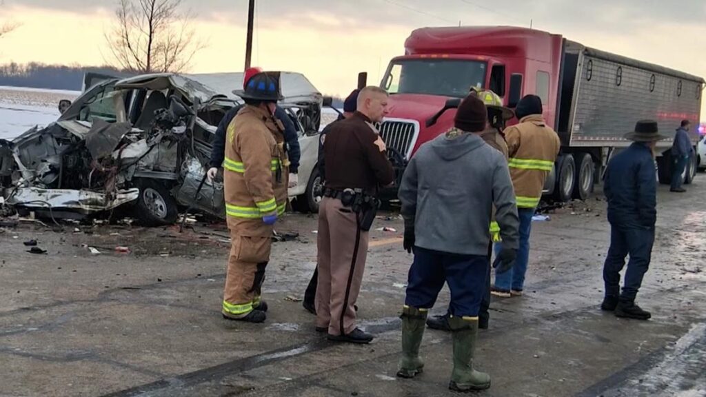 Heavy traffic showing commercial semi-trucks sharing the road with passenger vehicles