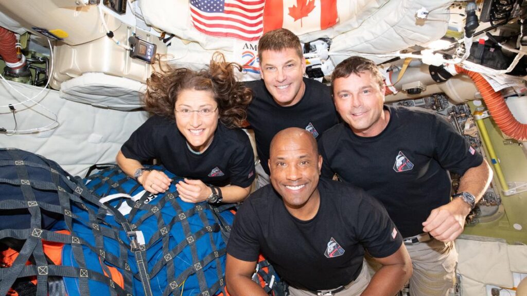 Artemis II Orion spacecraft splashing down in the ocean
