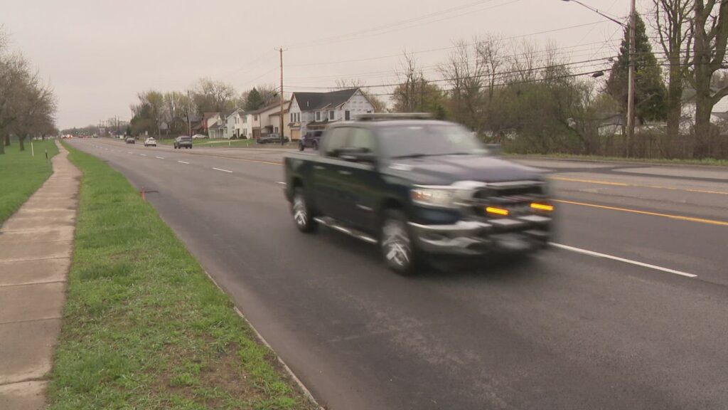 Construction crew working on road repair and infrastructure improvements in Erie County