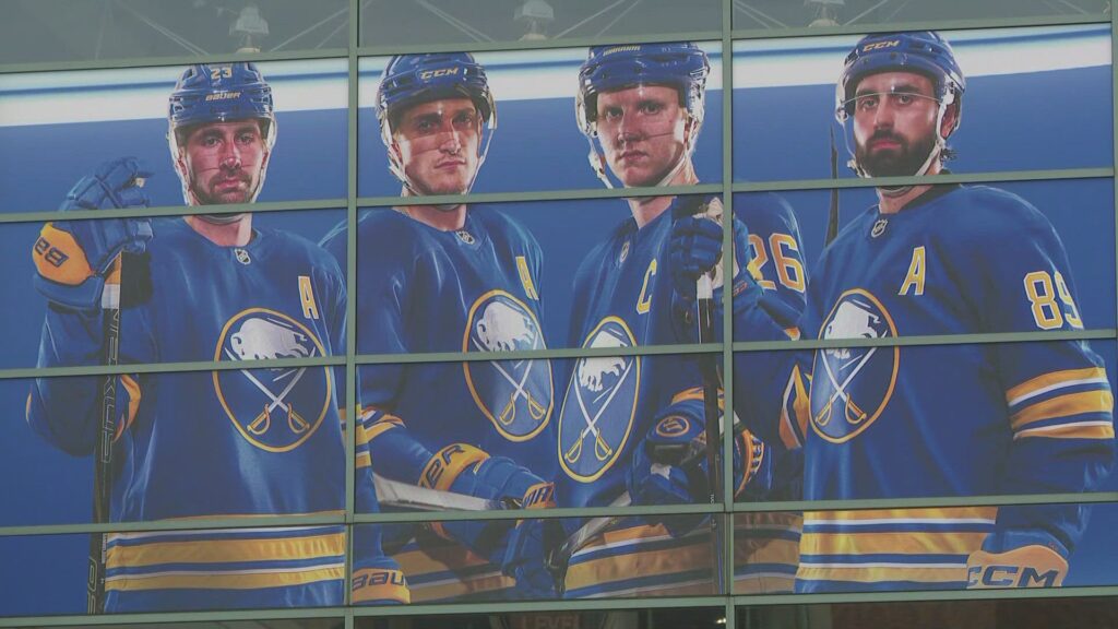 A massive crowd of Sabres fans celebrating outside KeyBank Center