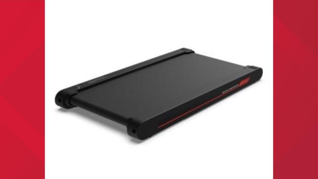 A person demonstrating the use of a treadmill, highlighting the risk of unexpected speed changes and falls.