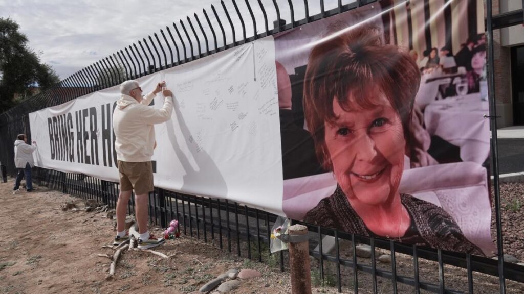 Law enforcement searching a neighborhood area for leads