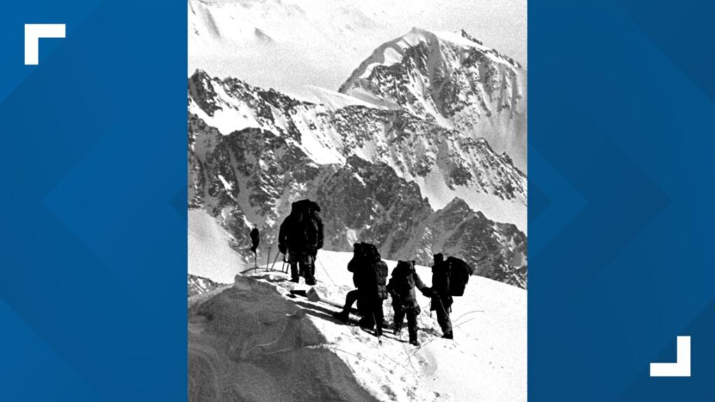 Jim Whittaker standing in the mountains